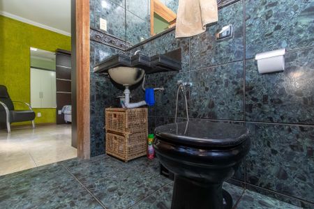 Casa à venda com 295m², 4 quartos e 2 vagasBanheiro da Suite