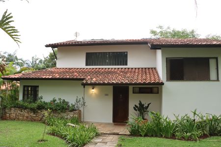 Casa de condomínio para alugar com 290m², 4 quartos e 4 vagasFachada