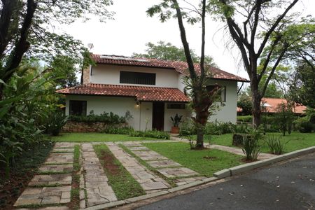 Casa de condomínio para alugar com 290m², 4 quartos e 4 vagasFachada