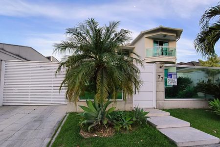 Casa de condomínio à venda com 485m², 4 quartos e 5 vagasFachada