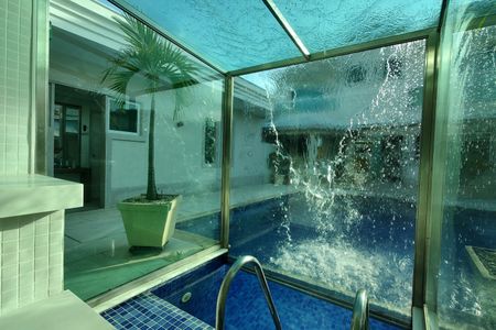 Casa de condomínio à venda com 485m², 4 quartos e 5 vagasSauna