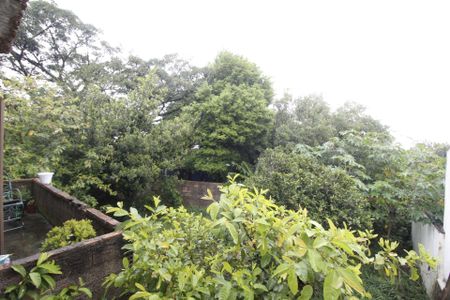 Sacada do Quarto 1 de casa à venda com 3 quartos, 100m² em Morro Santana, Porto Alegre