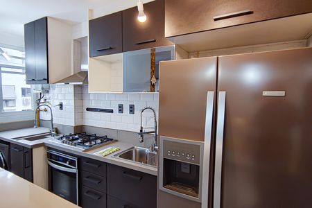 Apartamento à venda com 50m², 2 quartos e 1 vaga Apartamento à venda com 50m², 2 quartos e 1 vagaCozinha e Área de Serviço