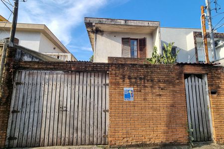 Casa à venda com 200m², 4 quartos e 3 vagas Casa à venda com 200m², 4 quartos e 3 vagasFachada
