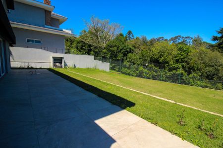 Casa de condomínio à venda com 248m², 4 quartos e 4 vagas Casa de condomínio à venda com 248m², 4 quartos e 4 vagasQuintal