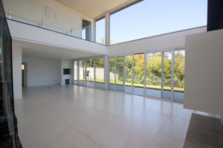 Sala de casa de condomínio à venda com 4 quartos, 248m² em Vila Nova, Porto Alegre