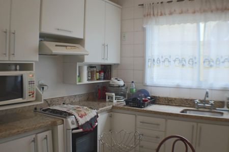 Casa à venda com 98m², 3 quartos e 2 vagas Casa à venda com 98m², 3 quartos e 2 vagasCozinha