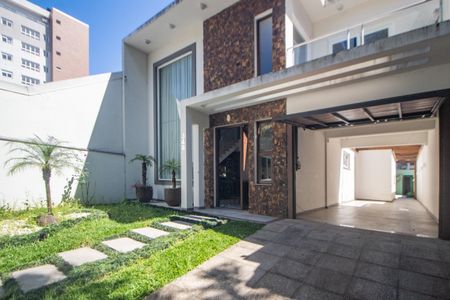 Casa à venda com 344m², 4 quartos e 2 vagas Casa à venda com 344m², 4 quartos e 2 vagasFachada