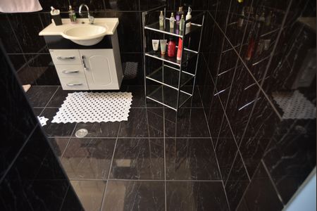 Casa à venda com 217m², 5 quartos e 2 vagasBanheiro da Suíte