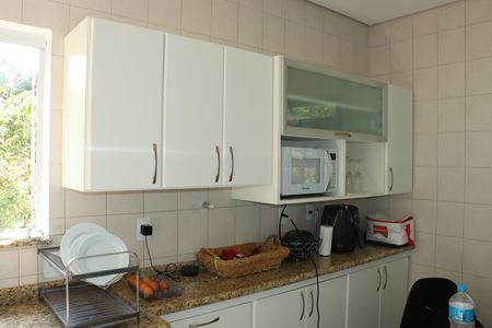 Casa de condomínio para alugar com 300m², 5 quartos e 4 vagasCozinha