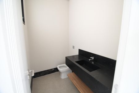 Casa de condomínio à venda com 404m², 4 quartos e 4 vagasLavabo