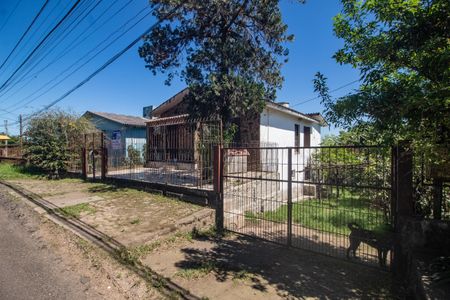 Casa à venda com 113m², 4 quartos e 2 vagas Casa à venda com 113m², 4 quartos e 2 vagasFachada