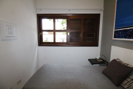 Casa de condomínio para alugar com 450m², 4 quartos e 6 vagasQuarto 1