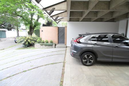 Casa de condomínio para alugar com 450m², 4 quartos e 6 vagasGaragem