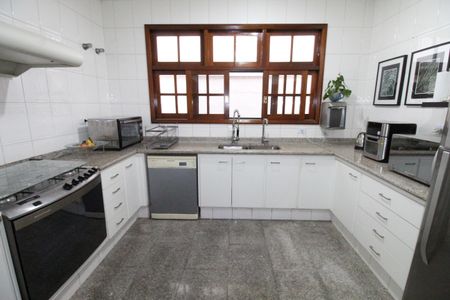 Casa de condomínio para alugar com 450m², 4 quartos e 6 vagasCozinha