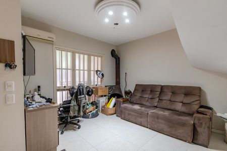 Sala de casa de condomínio à venda com 3 quartos, 150m² em Teresópolis, Porto Alegre