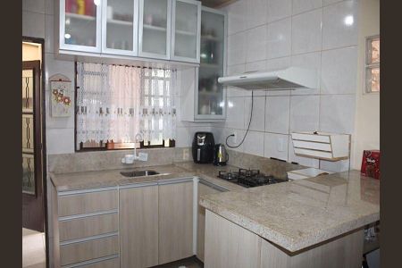 Cozinha  de casa à venda com 3 quartos, 180m² em Costa E Silva, Porto Alegre