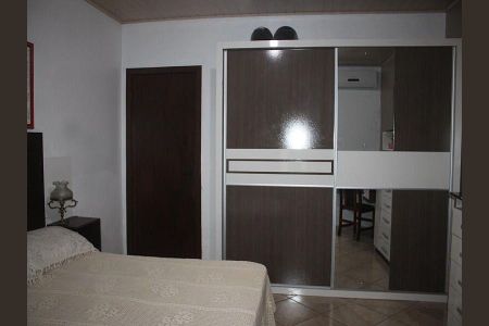 Quarto 1 de casa à venda com 3 quartos, 180m² em Costa E Silva, Porto Alegre
