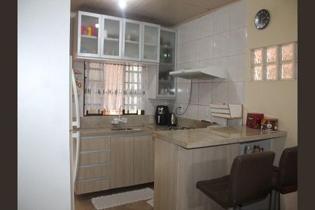 Cozinha  de casa à venda com 3 quartos, 180m² em Costa E Silva, Porto Alegre