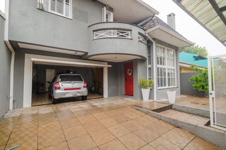 Casa à venda com 330m², 4 quartos e 4 vagas Casa à venda com 330m², 4 quartos e 4 vagasFachada