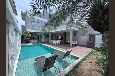 Casa de condomínio à venda com 407m², 5 quartos e 2 vagasÁrea externa