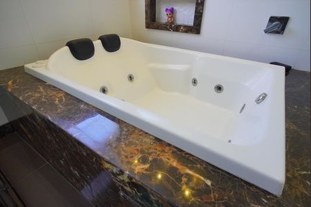 Casa de condomínio à venda com 241m², 3 quartos e 3 vagasBanheiro da Suíte 1