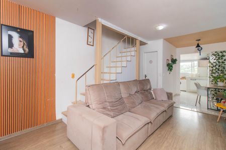 Sala de casa de condomínio à venda com 2 quartos, 56m² em Vila Nova, Porto Alegre