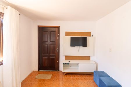 Sala de TV de casa à venda com 4 quartos, 92m² em Santo Antônio, Porto Alegre