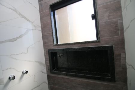 Casa à venda com 320m², 4 quartos e 2 vagasBanheiro da Suíte 2