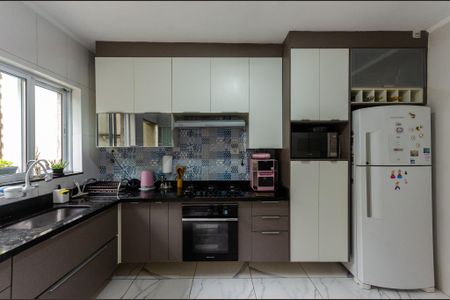 Casa à venda com 122m², 2 quartos e 2 vagas Casa à venda com 122m², 2 quartos e 2 vagasCozinha