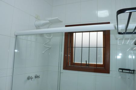 Casa de condomínio para alugar com 570m², 7 quartos e 6 vagasBanheiro da Suíte 2