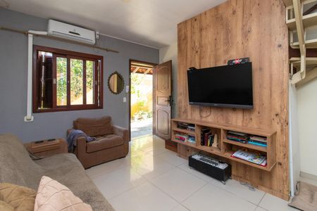 Sala de casa de condomínio à venda com 2 quartos, 65m² em Ipanema, Porto Alegre