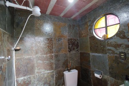 Casa de condomínio à venda com 330m², 4 quartos e 2 vagasBanheiro 2