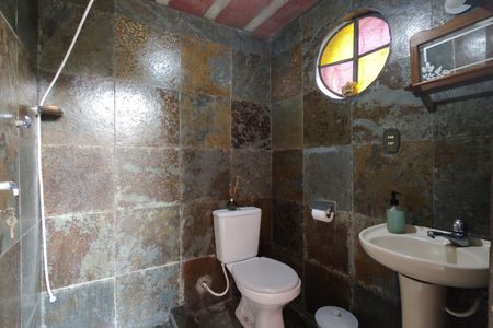 Casa de condomínio à venda com 330m², 4 quartos e 2 vagasBanheiro 2