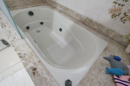 Casa de condomínio à venda com 330m², 4 quartos e 2 vagasBanheiro da Suíte