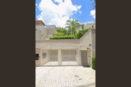 Casa de condomínio à venda com 872m², 6 quartos e 6 vagasFachada e portaria Condomínio