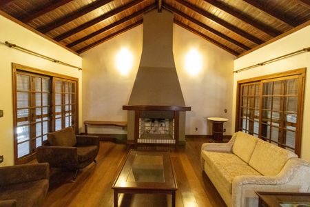 Sala de casa de condomínio à venda com 4 quartos, 504m² em Cavalhada, Porto Alegre