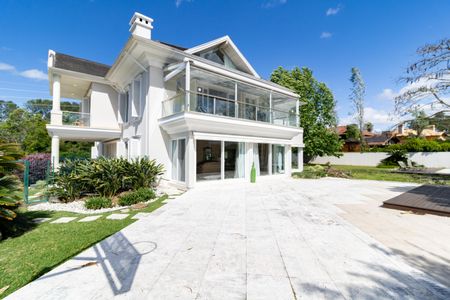 Casa de condomínio para alugar com 940m², 7 quartos e 1 vagaQuintal