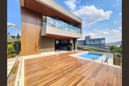 Casa de condomínio à venda com 372m², 4 quartos e 4 vagas Casa de condomínio à venda com 372m², 4 quartos e 4 vagasFachada