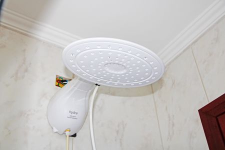 Casa de condomínio para alugar com 460m², 5 quartos e 6 vagasBanheiro da Suíte 2