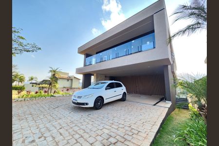 Casa de condomínio à venda com 442m², 5 quartos e 4 vagasFachada