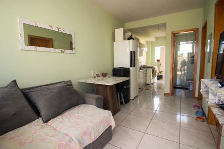 Sala de casa de condomínio à venda com 2 quartos, 50m² em Restinga, Porto Alegre