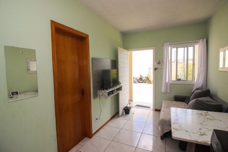 Sala de casa de condomínio à venda com 2 quartos, 50m² em Restinga, Porto Alegre