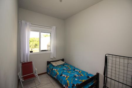Quarto 1 de casa de condomínio à venda com 2 quartos, 50m² em Restinga, Porto Alegre