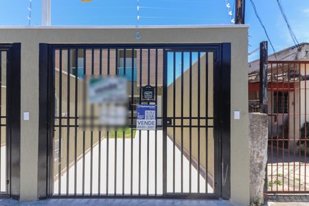 Casa à venda com 80m², 2 quartos e 2 vagasFachada - Plaquinha