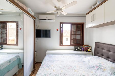 Quarto 1 de casa de condomínio à venda com 2 quartos, 70m² em Vila Nova, Porto Alegre