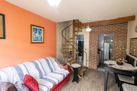 Sala de casa de condomínio à venda com 2 quartos, 70m² em Vila Nova, Porto Alegre