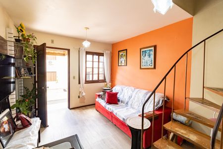 Sala de casa de condomínio à venda com 2 quartos, 70m² em Vila Nova, Porto Alegre