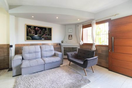 Sala de casa de condomínio à venda com 3 quartos, 148m² em Vila Nova, Porto Alegre