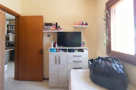 Quarto 1 de casa de condomínio à venda com 3 quartos, 148m² em Vila Nova, Porto Alegre